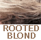 Ash Blond Visibly Rooted with a medium brown                